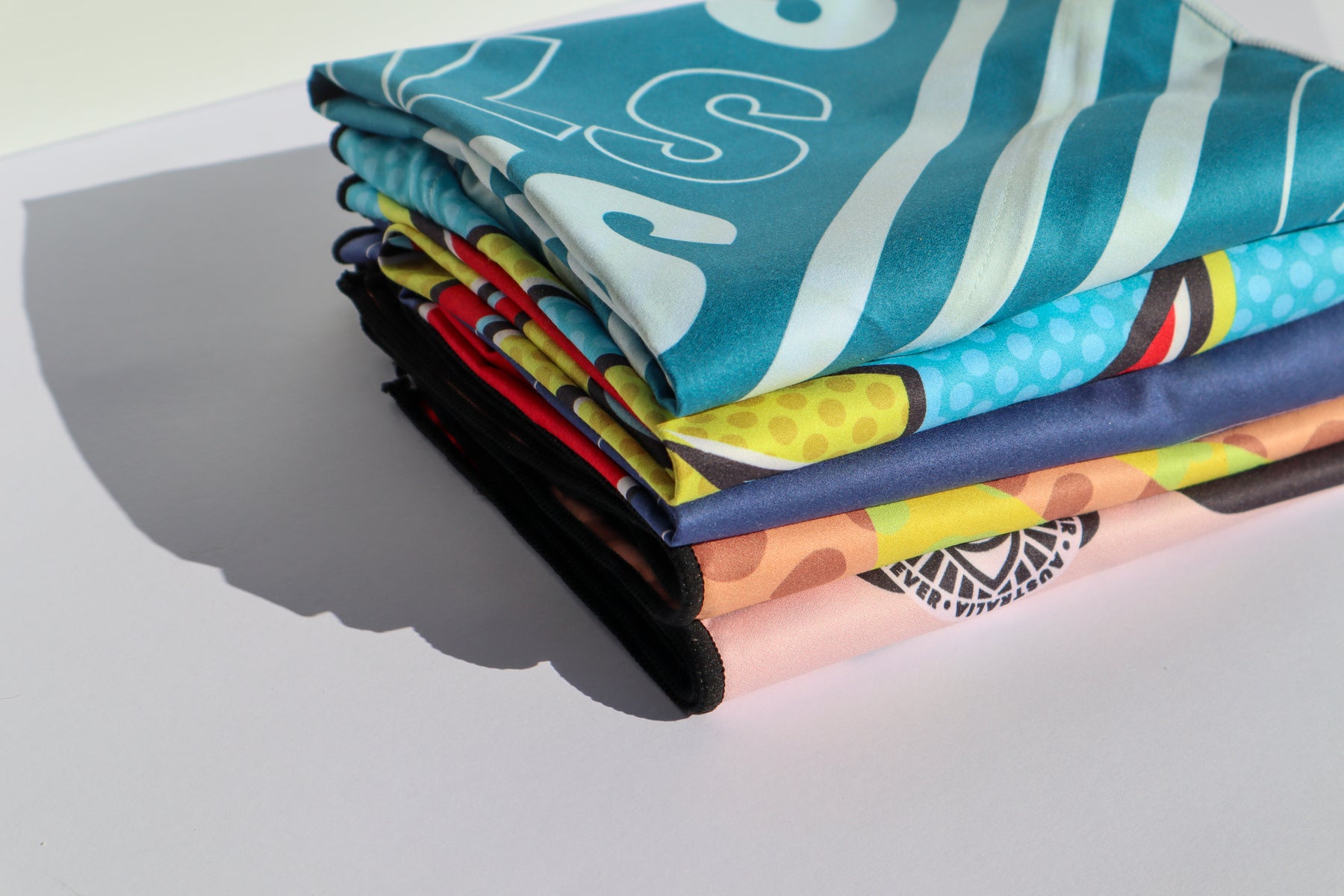 Shop Curated Beach & Fitness Towel Bundles. Australian designed, made with post-consumer recycled plastic.