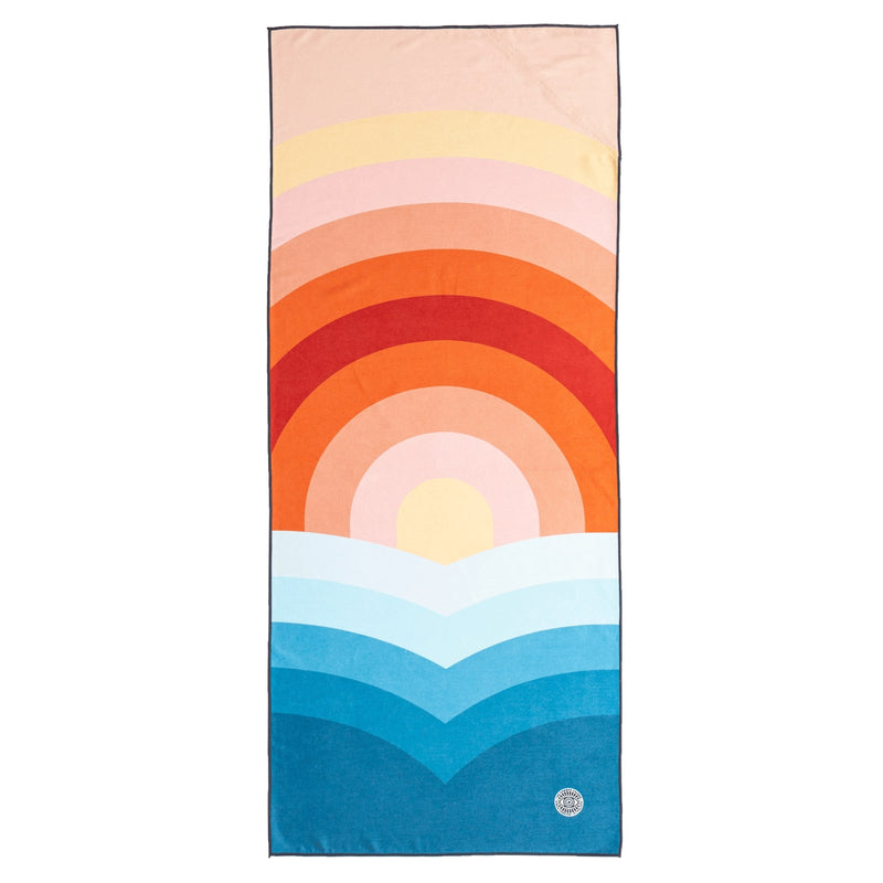 The Summer Chaser sustainable travel towel for beach, pool and yoga. Made of recycled yarns. Flat top view of Dipping Sun design.